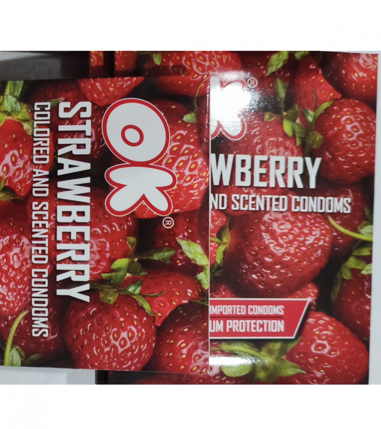 OK Strawberry colored And Scented Condoms